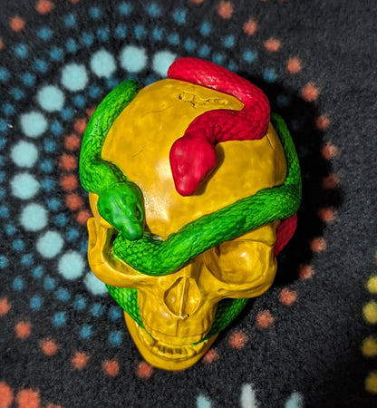 Ceramic Skull With Red and Green Snakes